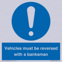 vehicles-must-be-reversed-with-a-banksman~